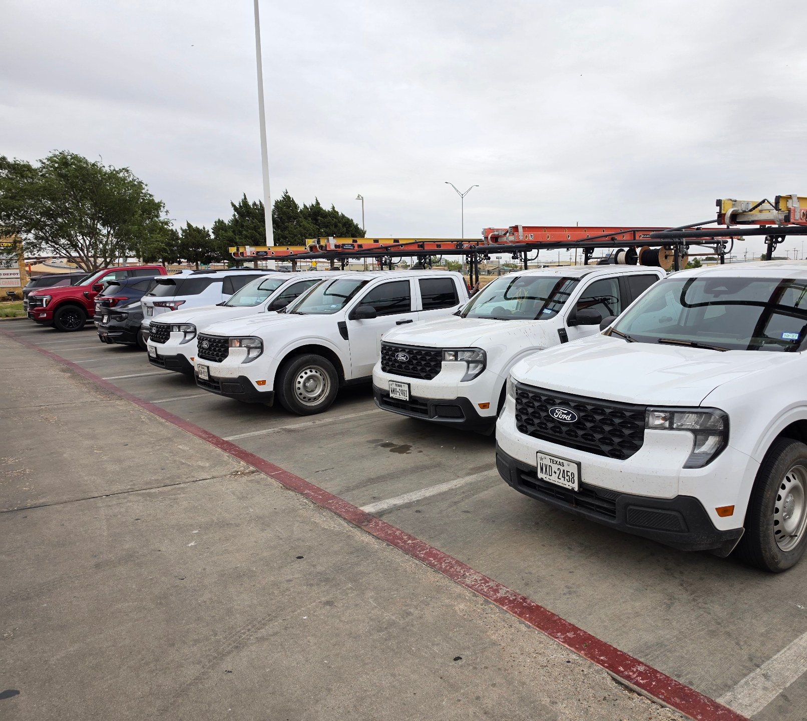 RunnerRunner Inc. fleet of fiber installation trucks